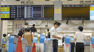 Electric signs are turned off at Nagoya Station on Tuesday amid the suspension of shinkansen services between Nagoya and Okayama stations.
