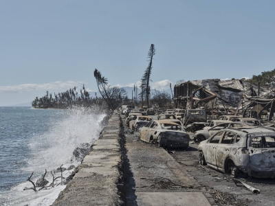 Destroyed buildings and cars along Front Street in Lahaina, Hawaii, two days after the historic town on Maui was devastated by wildfire on Aug. 11. 