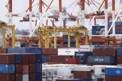 Containers in a shipping terminal at the Honmoku pier in Yokohama in June