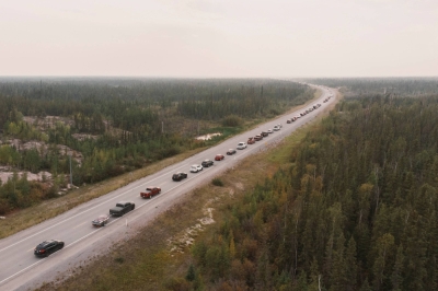 Yellowknife residents leave the city Wednesday on the only highway in or out of the northern Canadian community after an evacuation order was given due to a wildfire.