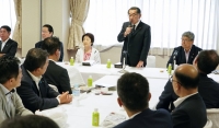 Ryu Shionoya speaks during a faction meeting on Thursday in Tokyo. | KYODO