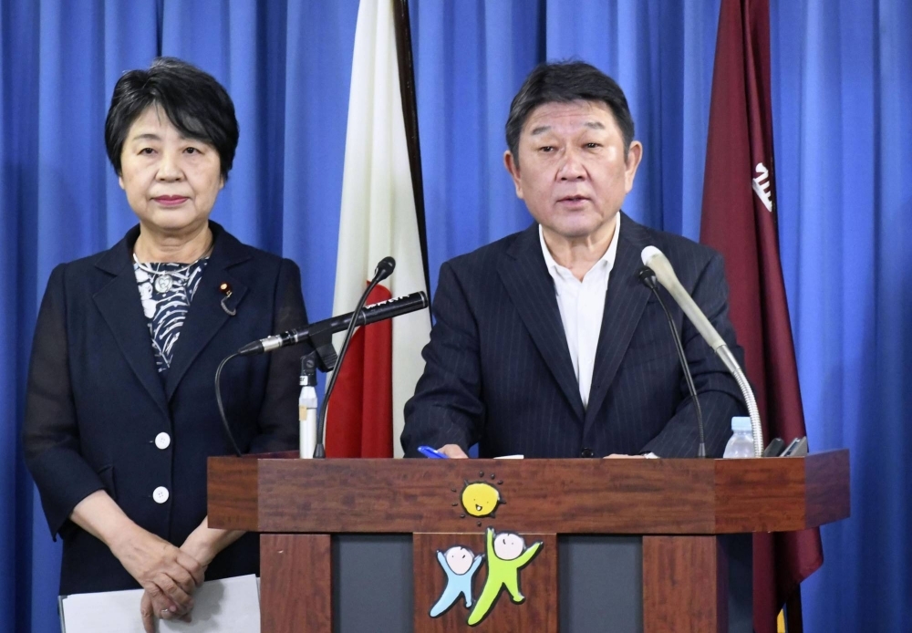 Liberal Democratic Party Secretary-General Toshimitsu Motegi announces support measures to increase the number of female lawmakers at the party's headquarters in Tokyo on Aug. 1.