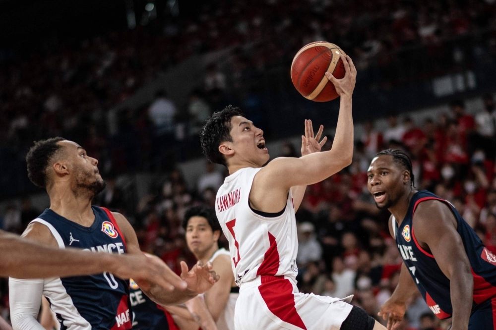 Japan's Yuki Kawamura attempts a shot against France during their game at Ariake Arena on Thursday night. 
