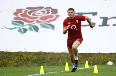 England captain Owen Farrell runs during training in Bagshot, England, on July 31.