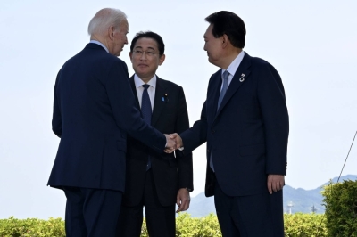 U.S. President Joe Biden, Prime Minister Fumio Kishida and South Korean leader Yoon Suk-yeol meet during the Group of Seven summit in Hiroshima in May. 