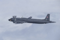 A Russian IL-38 information-gathering aircraft flies between the Sea of Japan and the East China Sea in a photo taken by the Air Self-Defense Force on Friday.  | Joint Staff Office of the Defense Ministry / via REUTERS