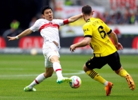 Wataru Endo (left) in action for VfB Stuttgart in April | Reuters