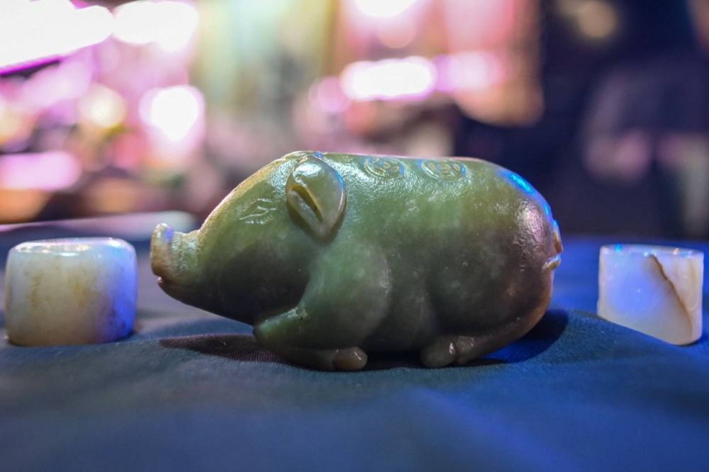 A jade pig from the Ming dynasty (1368-1644) at the shop of jade trader Lee in Taipei. Taiwan's jade trading sector is flagging post-COVID.