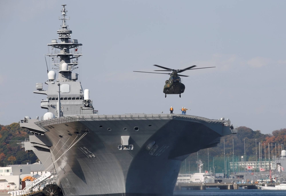 The Maritime Self-Defense Force's Izumo helicopter carrier could join U.S. and Australian forces for a trilateral naval drill next week in the South China Sea.