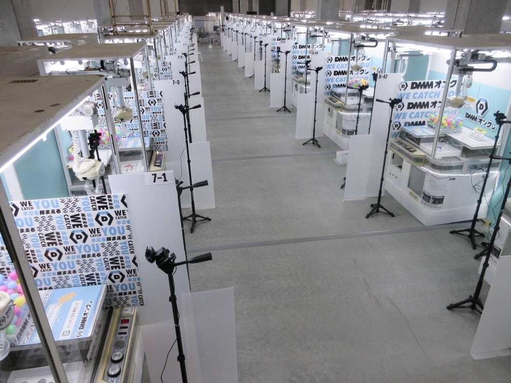 About 500 machines for DMM.com's claw games are placed a warehouse in Saitama Prefecture.
