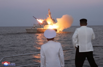 North Korean leader Kim Jong Un oversees a "strategic cruise missile" test aboard a navy warship in this undated photo released Monday. 