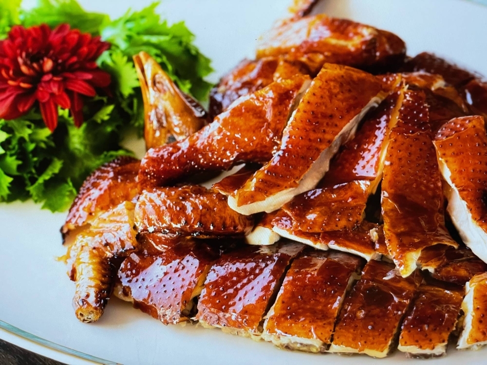 Kapo Choryumon's signature crispy chicken, like much of Hong Kong cuisine, is a blend of influences from the former city-state's long and varied history.