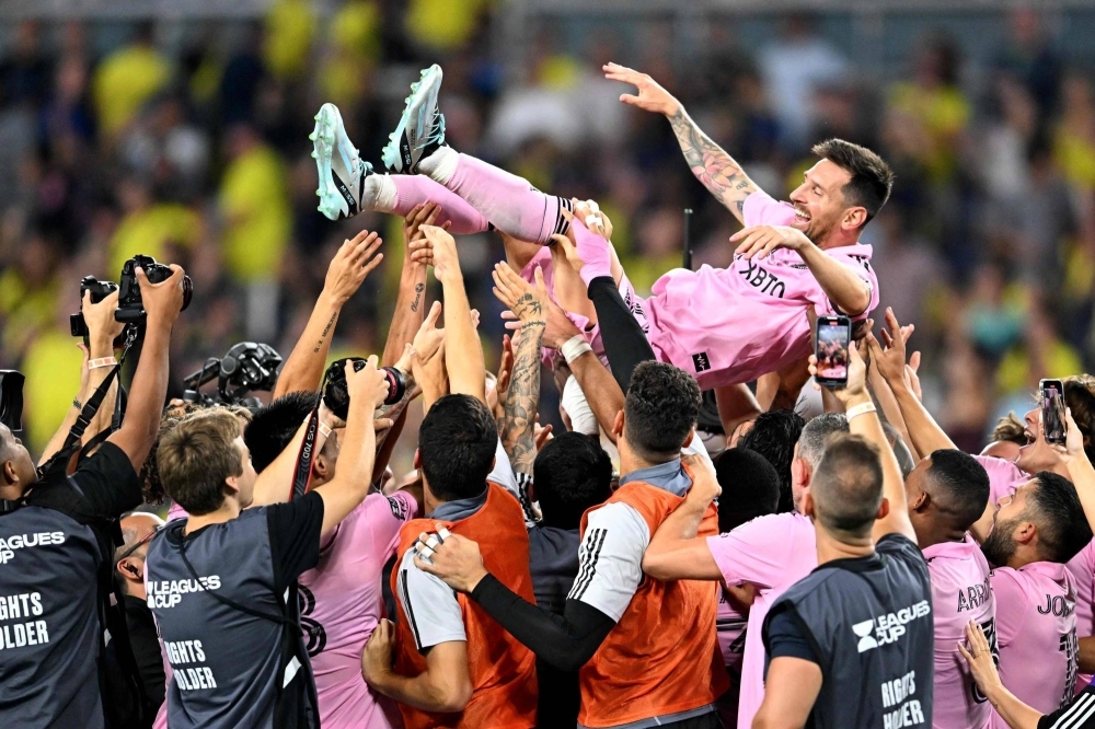 Lionel Messi is tossed in the air by his teammates after Miami's win in the Leagues Cup final on Nashville, Tennessee, on Sunday.