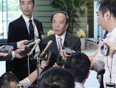 Bank of Japan Gov. Kazuo Ueda speaks to reporters after meeting with Prime Minister Fumio Kishida at the Prime Minister's Office in Tokyo on Tuesday.