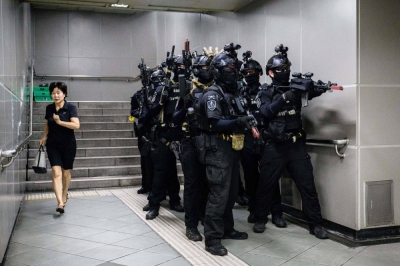 South Korean soldiers prepare for a counterterrorism drill, as part of the Ulchi Freedom Shield military exercises between the U.S. and South Korea, at a subway station in Seoul on Wednesday.