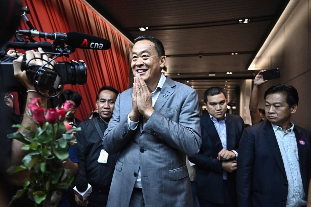 Thailand's new Prime Minister Srettha Thavisin meets with media at the Pheu Thai Party headquarters in Bangkok on Wednesday. 