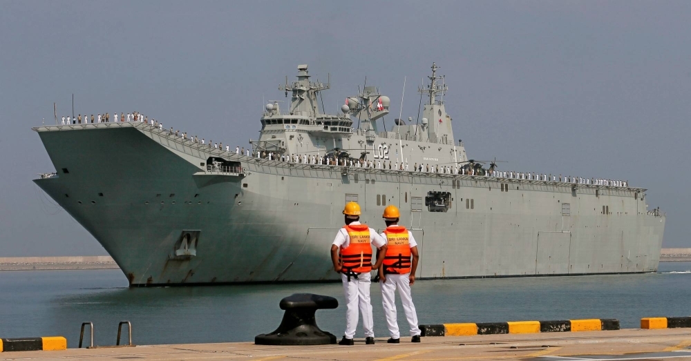 The HMAS Canberra sails to the main harbor in Colombo, Sri Lanka, in March 2019. The vessel participated in a bilateral exercise between Australia's navy and the Maritime Self-Defense Force on the way to the Philippines, an Australian defense spokesperson said Wednesday.