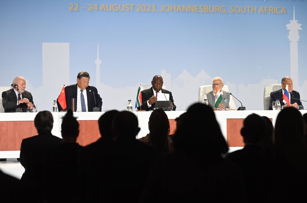 (From left to right) Brazilian President Luiz Inacio Lula da Silva, Chinese President Xi Jinping, South African President Cyril Ramaphosa, Indian President Narendra Modi and Russian foreign minister Sergey Lavrov on the closing day of the BRICS summit in Johannesburg on Thursday. 