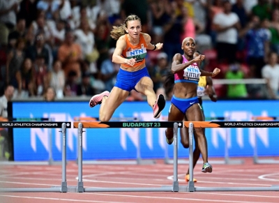 The Netherlands' Femke Bol (left) and Shamier Little of the U.S. compete during the women's 400-meter hurdles at the world championships in Budapest on Thursday.