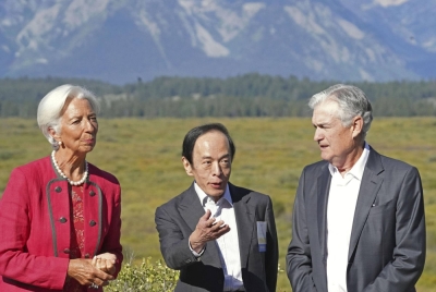 Christine Lagarde (left), president of the European Central Bank, Kazuo Ueda, governor of the Bank of Japan (center) and Jerome Powell, chairman of the U.S. Federal Reserve, at the Jackson Hole economic symposium in Moran, Wyoming, on Friday