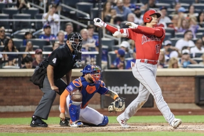 Los Angeles Angels designated hitter Shohei Ohtani smacks an RBI triple in the second inning against the New York Mets in New York. 
