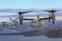 Three MV-22B tilt-rotor Ospreys fly in formation above the Pacific Ocean off the coast of Sydney in June 2017. A U.S. Marine Osprey crashed on a remote island north of Australia's mainland while taking part in military exercises on Sunday. | U.S. MARINE CORPS / VIA AFP-JIJI