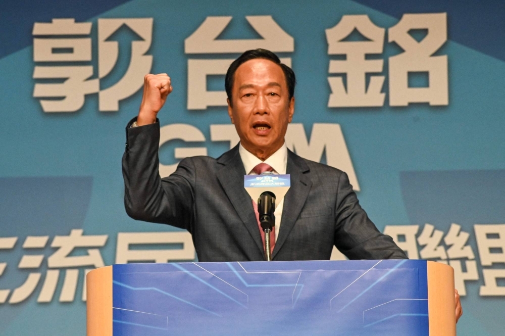 Former Foxconn founder Terry Gou gestures during a news conference in Taipei on Monday. Gou announced that he will run for president of Taiwan as an independent candidate.