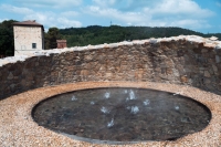 An artificial lagoon of water and steam, a reconstruction of Francesco Larderel's invention for the extraction and processing of boric acid | Bloomberg