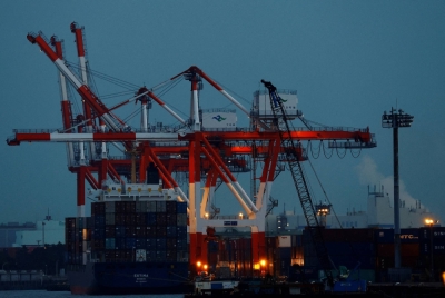 Japan's exports have been "picking up recently," the government said in its latest monthly economic assessment, its first upward revision since May,