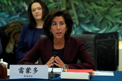 U.S. Commerce Secretary Gina Raimondo, right, speaks during a meeting with her Chinese counterpart Wang Wentao in Beijing on Monday. 