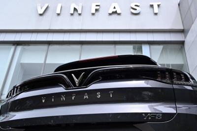 A VinFast electric car is parked outside a showroom in Hanoi on Aug. 18.