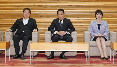 Foreign Minister Yoshimasa Hayashi, Prime Minister Fumio Kishida and economic security minister Sanae Takaichi attend a Cabinet meeting on Tuesday.