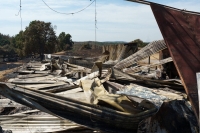 A livestock pen destroyed by wildfire in the National Park of Dadia, Alexandroupolis, Greece, on Tuesday. | Bloomeberg