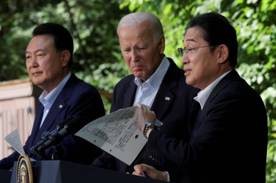 Prime Minister Fumio Kishida, U.S. President Joe Biden and South Korean leader Yoon Suk-yeol hold a news conference during the trilateral summit at Camp David, Maryland, on Aug. 18.

