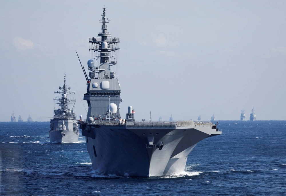 The Maritime Self-Defense Force's Hyuga destroyer leads the MSDF fleet during the International Fleet Review to commemorate the 70th anniversary of the MSDF's foundation, in Sagami Bay, off Yokosuka, Kanagawa Prefecture, last November. The Maritime Self-Defense Force's Hyuga destroyer leads the MSDF fleet during the International Fleet Review to commemorate the 70th anniversary of the MSDF's foundation, in Sagami Bay, off Yokosuka, Kanagawa Prefecture, last November.