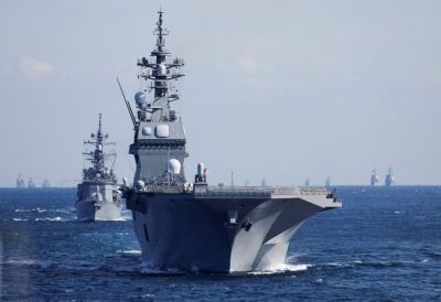 The Maritime Self-Defense Force's Hyuga destroyer leads the MSDF fleet during the International Fleet Review to commemorate the 70th anniversary of the MSDF's foundation, in Sagami Bay, off Yokosuka, Kanagawa Prefecture, last November.