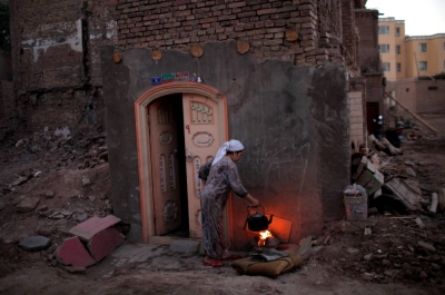 A woman cooks in the old district of Kashgar, in China's Xinjiang region, in 2011.