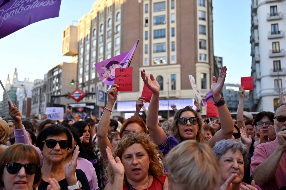 Protesters applaud during a demonstration called by feminist associations in support of Spain's midfielder Jenni Hermoso in Madrid on Monday.