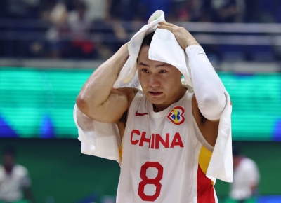 China's Peng Zhou on Wednesday after his team's defeat. China's women's team is a global powerhouse, but the men have failed to meet expectations in recent years despite an infusion of naturalized players from overseas.