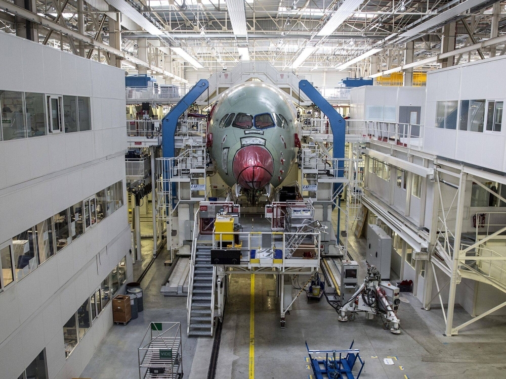 An Airbus A350 XWB passenger aircraft on the final assembly line at the Airbus factory in Toulouse, France