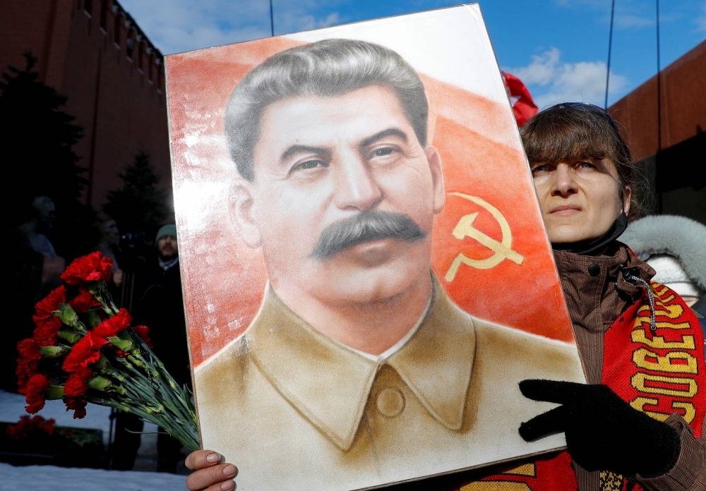 Russian Communist Party supporters attend a ceremony in Red Square on March 5, 2021, marking the 68th anniversary of Soviet leader Josef Stalin’s death.