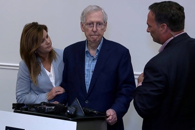Sen. Mitch McConnell appears to freeze up for more than 30 seconds during a public appearance before he was escorted away, the second such incident in a little more than a month, after an event with the Northern Kentucky Chamber of Commerce in Covington, Kentucky, on Wednesday. 