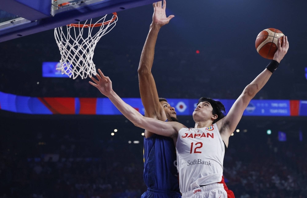 Yuta Watanabe in action with Cape Verde's Edy Tavares