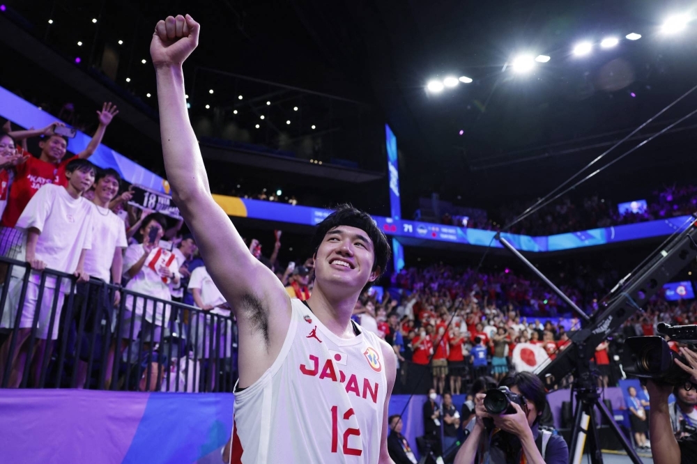 Japan's Yuta Watanabe celebrates after the team's win over Cape Verde during the FIBA Basketball World Cup in Okinawa on Saturday. Japan earned an Olympic berth with the win.