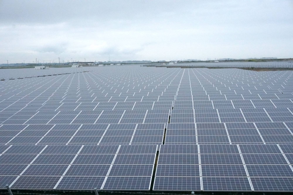Solar panels in Minamisoma. The plant's panels, if laid out side by side, would cover 350 kilometers.