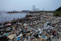 Rubbish, most of which is plastics, along a shoreline in Jakarta | Reuters