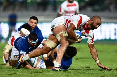Japan's Michael Leitch attempts to break free during a match against Italy in Treviso, Italy, on Aug. 26.