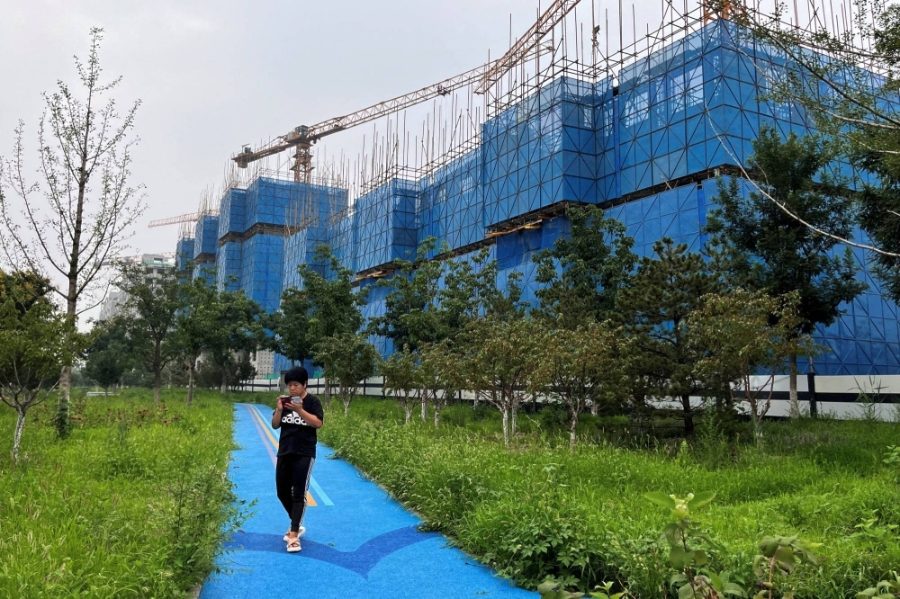A construction site of residential buildings by Chinese developer Country Garden in Beijing. Some economists now see growth in China’s economy slowing to 3.5% in 2030 and to near 1% by 2050.
