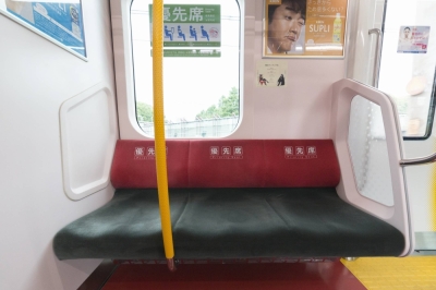 The typical priority seat section on a Japanese train will be well marked in numerous languages. 
