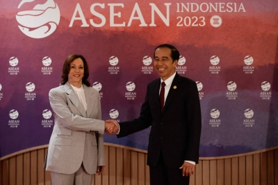U.S. Vice President Kamala Harris (left) shakes hands with Indonesia's President Joko Widodo before their bilateral meeting on the sidelines of the 43rd ASEAN Summit in Jakarta on Wednesday.